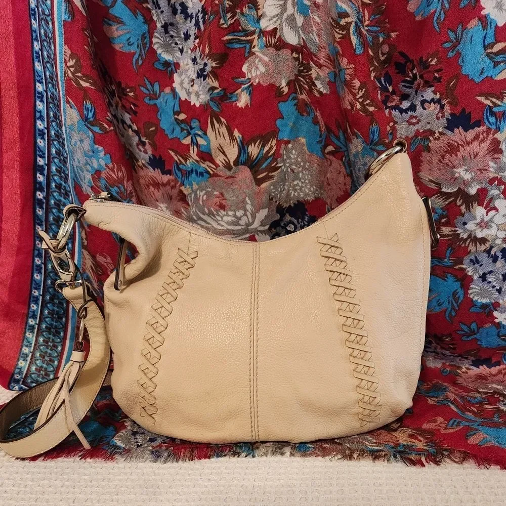 Tignanello cream colored satchel. Side pockets.